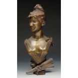 A FRENCH BRONZE BUST of a Society girl with low cut dress and ribbon swag and fan ornament, signed