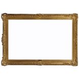 A LARGE 18TH CENTURY STYLE GILT FRAME of swept rococo form, rebate size 76 x 127cm