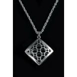 Kultaseppa Salovaara Pendant of square convex form with pierced disc decoration signed and
