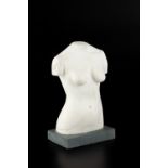 Manner of Barbara Hepworth (1903-1975) Female torso marble, on composite base 23.5cm high.