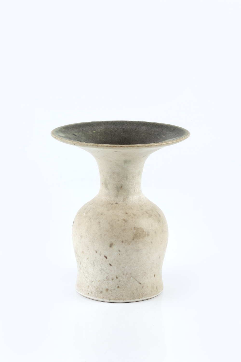 Geoffrey Eastop (1921-2014) Vase oatmeal glaze, with wide rim painted potter's monogram 16cm high.