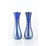 Loetz Pair of vases blue iridescent glass with swirling pattern etched marks 17cm high (2).
