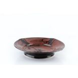 Margaret Frith (b.1943) Dish red copper glaze impressed potter's seal 29.3cm across.