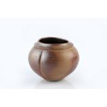 Nick Rees (b.1949) at Muchelney Pottery Vase segmented form, brown glaze impressed pottery and