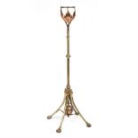 W.A.S Benson Standard lamp, circa 1880 brass and copper, claw feet and copper leaf shaped decoration