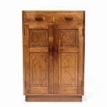 Manner of Edward Barnsley (1900-1987) Cotswold School cabinet oak, two short drawers over cupboard