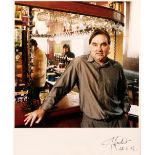 Trevor Ray Hart (b.1967) George Best at The Phene Arms signed and dated photograph 40.6cm x 30.3cm.