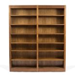 Robert Thompson of Kilburn (1876-1955) Mouseman bookcase two sections with fourteen adjustable