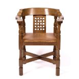 Robert Thompson of Kilburn (1876-1955) Mouseman monk's chair oak, the curved back with woven design,