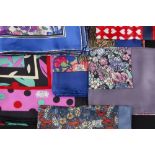 Liberty A collection of silk and fabric scarves various designs and colourways the largest scarf