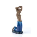 Johannes Hedegaard for Royal Copenhagen Kneeling girl, model no. 21739 part blue glaze signed and