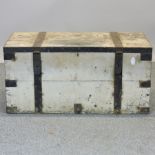 An early 20th century metal bound painted pine trunk,