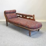 A Victorian walnut red floral upholstered chaise lounge,