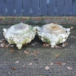 A pair of carved stone capitals,