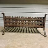 A cast iron fire grate,