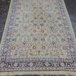 A large woollen rug, 518 x 353cm,