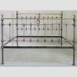 A Victorian iron double bedstead,