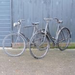 A black painted vintage gentleman's bicycle,