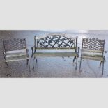 A wrought iron and wooded slatted garden bench, 129cm,