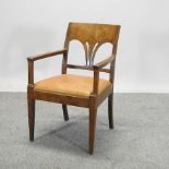 A 1920's birch desk chair