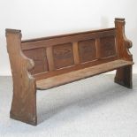 A Victorian pine pew,