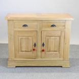 A modern oak side cabinet,