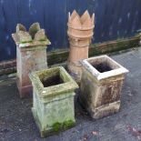 A Victorian stone chimney pot with a crown top, 84cm high,