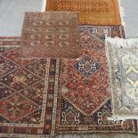 A collection of five various rugs,