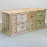 An antique pine merchant's chest,