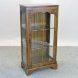 A walnut astragal glazed display cabinet,