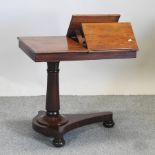 A William IV mahogany reading table,