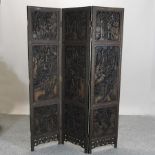 A Chinese carved hardwood dressing screen,