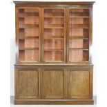 An Edwardian mahogany glazed cabinet bookcase, of large proportions,