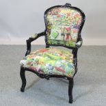 A comic upholstered show frame open armchair