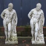 A pair of reconstituted stone garden figures of Hercules,