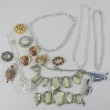 A collection of costume jewellery, to include brooches,