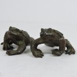 A pair of decorative Chinese style bronze models of frogs,