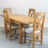 A modern oak extending dining table, 194 x 85cm,