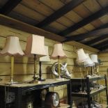 A collection of eight various early 20th century table lamps