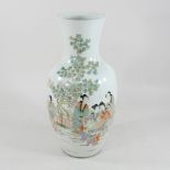 A Chinese white glazed porcelain vase, decorated with figures,