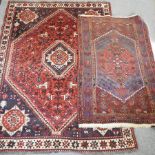 A Qum carpet, with a central medallion, decorated with animals, on a red ground, 280 x 204cm,