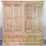 A modern pine double wardrobe,