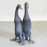 A bronzed garden model of a pair of ducks,