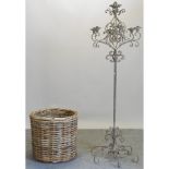 A metal standard candelabra, 193cm high,