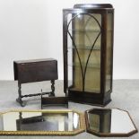A 1930's walnut display cabinet, together with a drop leaf table, a book rest,