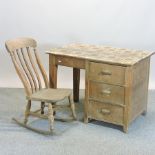A 1930's light oak desk, 106cm,