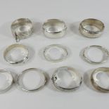 A collection of silver and white metal bangles