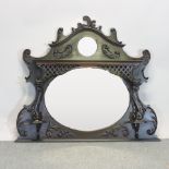 An Edwardian carved mahogany over mantel mirror,