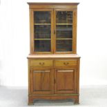 A Victorian walnut cabinet bookcase,