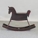 A wooden rocking horse,